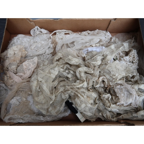 63 - Two boxes of various lacework including a black Chantilly shawl