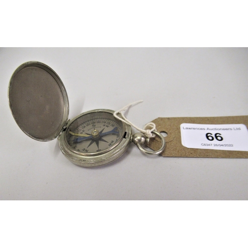 66 - 20th Century steel cased compass with silvered dial, inscribed Whittnauer, the outer case stamped U.... 