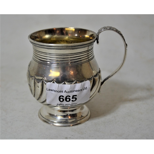 665 - Small George IV silver Christening mug of baluster half fluted design with a scroll handle, London 1... 