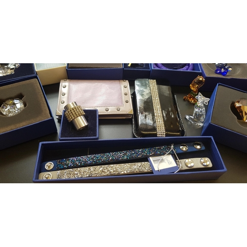 806 - Twenty five items of Swarovski jewellery and other items, most in original boxes