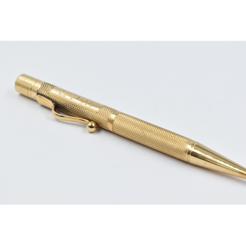 822 - 9ct Gold propelling pencil inscribed ' Baker's Pointer ', gross weight 27g