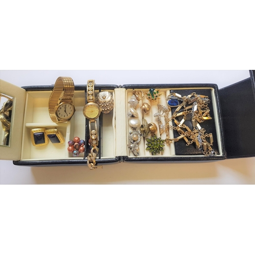 915 - Two boxes containing a small quantity of various costume jewellery