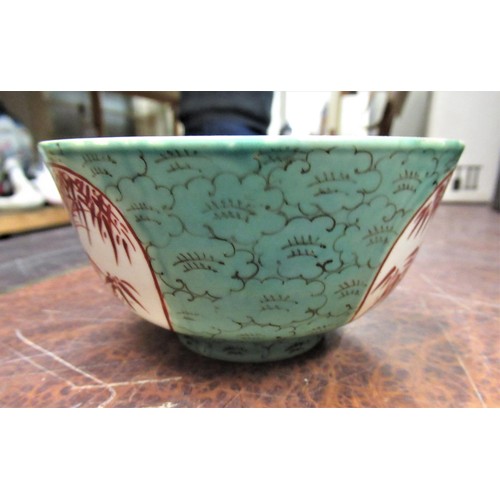 584 - Small Chinese porcelain bowl decorated with figures, red seal mark to base, 4.5ins diameter together... 