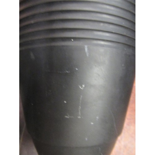 596 - Wedgwood Keith Murray black basalt vase of ribbed tapering form, 8ins high