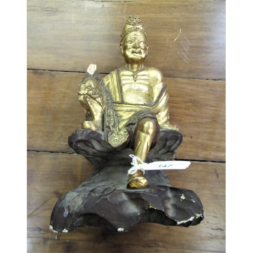 147 - Asian carved wooden and gilded figure of a seated sage (at fault), 10.5ins high and a carved wooden ... 