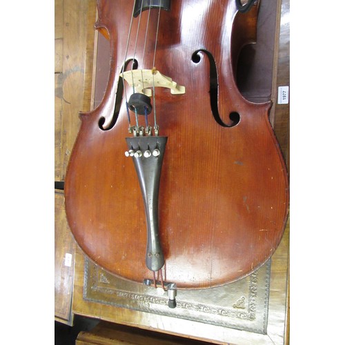 192 - Late 19th / early 20th Century cello with 29.5in two section back, with bow, in a soft case