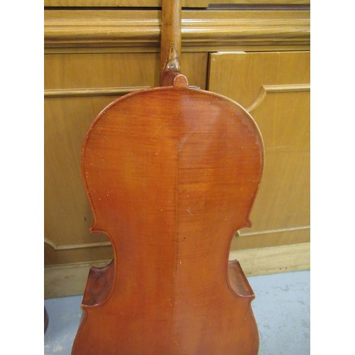 192 - Late 19th / early 20th Century cello with 29.5in two section back, with bow, in a soft case