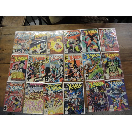 312 - Box containing a collection of various comics, including Fantastic Four 1970's, Batman 1980's, Shaza... 