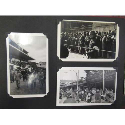 231 - Red photograph album containing a collection of various Chinese photographs and postcards