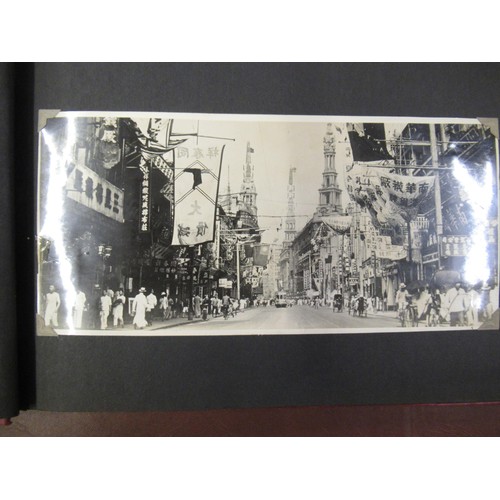 231 - Red photograph album containing a collection of various Chinese photographs and postcards