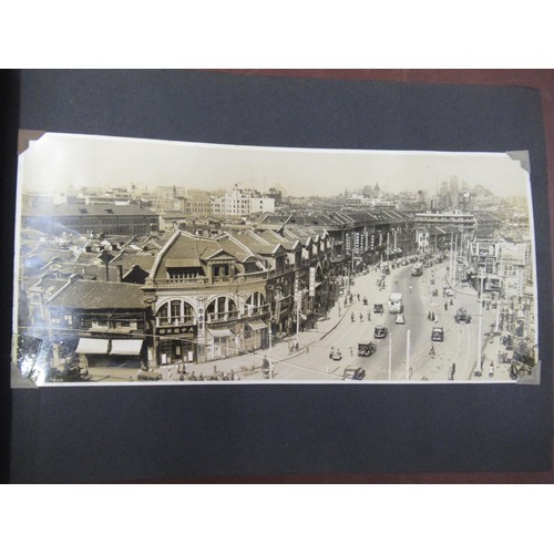 231 - Red photograph album containing a collection of various Chinese photographs and postcards