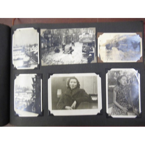 231 - Red photograph album containing a collection of various Chinese photographs and postcards