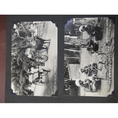 231 - Red photograph album containing a collection of various Chinese photographs and postcards