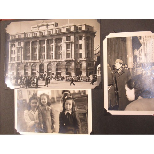 231 - Red photograph album containing a collection of various Chinese photographs and postcards