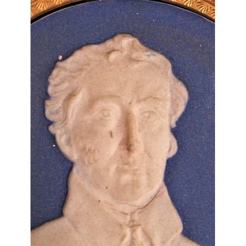 548 - Wedgwood blue and white jasperware plaque, mounted in a gilt and ebonised frame possibly of Wellingt... 