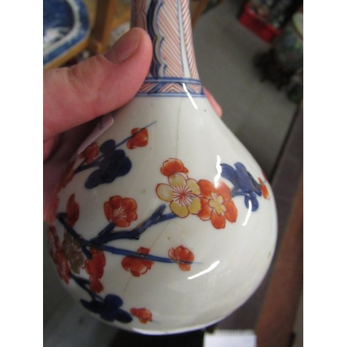 609 - Chinese porcelain bottle vase painted in red, blue and gilt with flowers, 8ins high