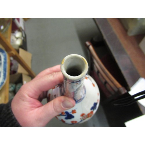 609 - Chinese porcelain bottle vase painted in red, blue and gilt with flowers, 8ins high