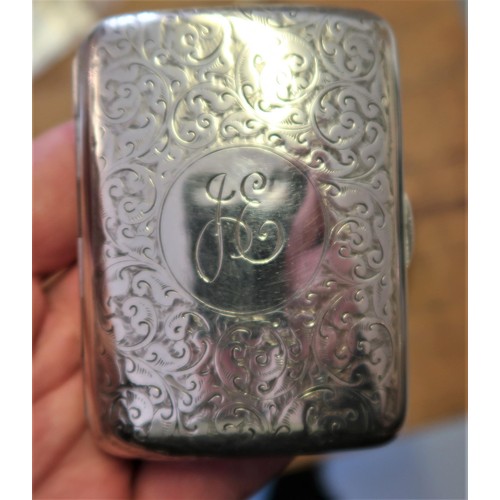 735 - Silver mounted embossed leather cigar case, silver floral engraved cigarette case, filigree work mat... 