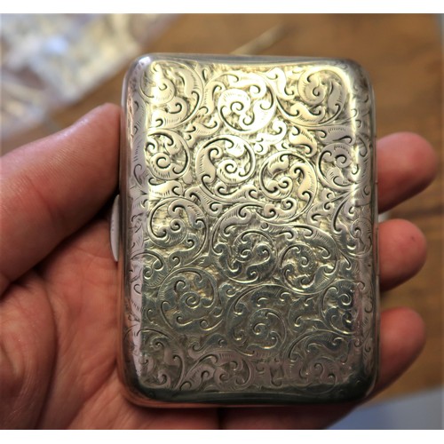 735 - Silver mounted embossed leather cigar case, silver floral engraved cigarette case, filigree work mat... 