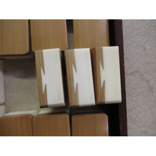 195 - Early 20th Century Mahjong set in hardwood case with bone and bamboo counters