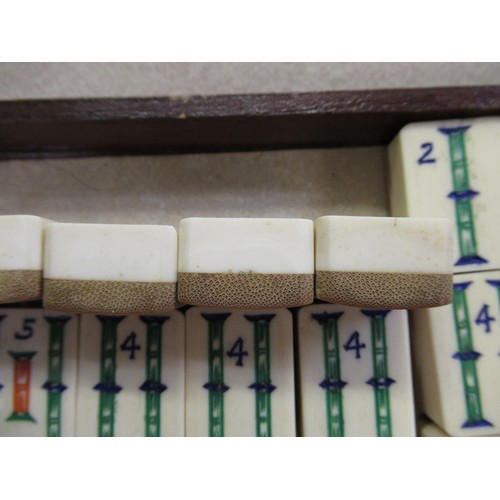 195 - Early 20th Century Mahjong set in hardwood case with bone and bamboo counters