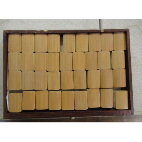 195 - Early 20th Century Mahjong set in hardwood case with bone and bamboo counters