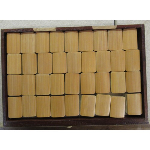 195 - Early 20th Century Mahjong set in hardwood case with bone and bamboo counters