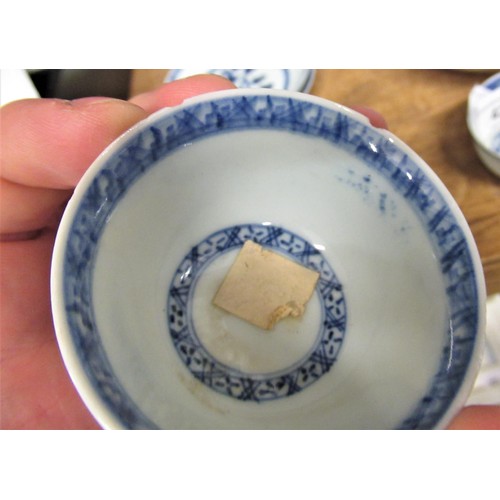 436 - Three Chinese Nanking Cargo blue and white tea bowls and two saucers