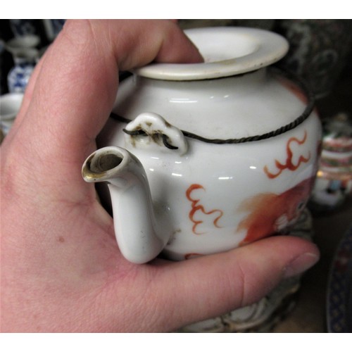 503 - 19th Century Canton enamel teapot having enamel decoration with birds, flowers and panels of figures... 