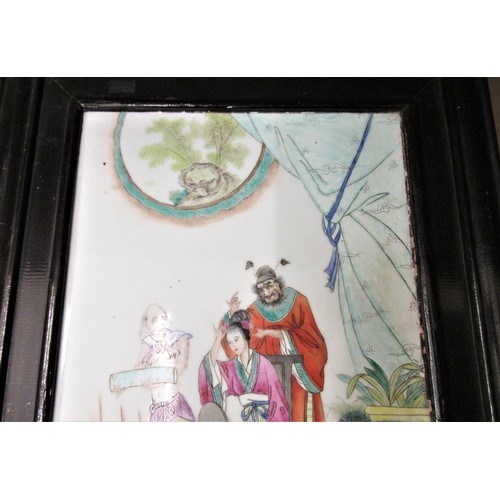 520 - 20th Century Chinese porcelain plaque decorated with a group of figures, 16.5ins x 10ins, in a lacqu... 