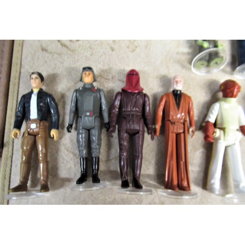 292 - Group of three carded Star Wars, Return of the Jedi figures together with a similar Empire Strikes B... 