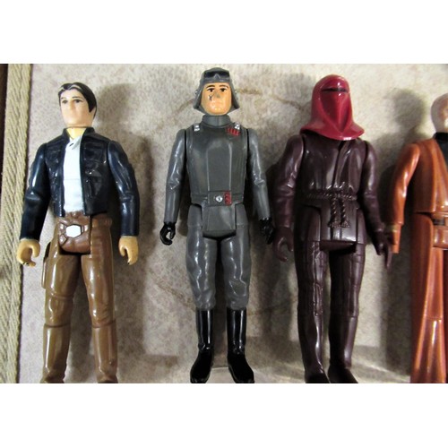 292 - Group of three carded Star Wars, Return of the Jedi figures together with a similar Empire Strikes B... 