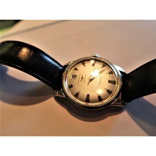 883 - Gentleman's Longines Conquest automatic wristwatch, the silvered dial with gilt baton numerals and d... 