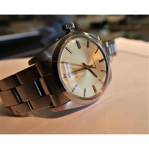 912 - Rolex Oyster Precision mid size wristwatch, the gilt dial with baton numerals and sweep seconds hand... 