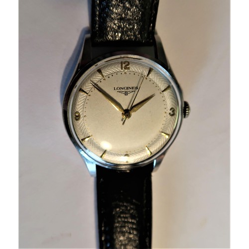 944 - Longines gentleman's circular crown wind stainless steel wristwatch, the silvered dial with gold num... 