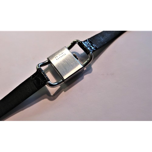 947 - Jaeger Le Coultre, ladies rectangular stainless steel wristwatch, on a black leather strap