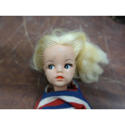 191 - One Sindy doll and one Action Girl together with clothing and accessories