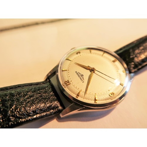 944 - Longines gentleman's circular crown wind stainless steel wristwatch, the silvered dial with gold num... 