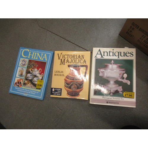 560 - Two boxes containing a collection of various books related to ceramics, art and antiques