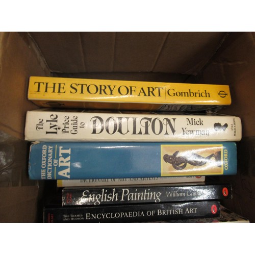 560 - Two boxes containing a collection of various books related to ceramics, art and antiques