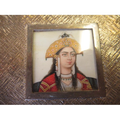 706 - Square silver box containing a head and should portrait miniature of a female wearing a headress