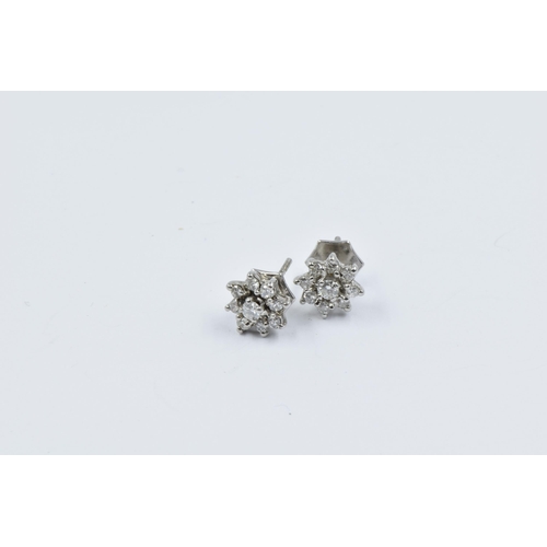 1002 - Pair of 18ct White gold nine stone diamond cluster stud earrings