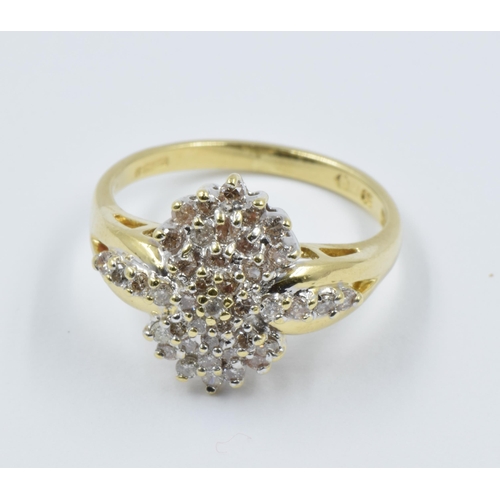 1038 - 18ct Yellow gold multiple diamond cluster ring