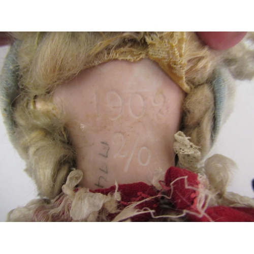 223 - Early 20th Century bisque headed doll with sleeping eyes, open mouth and four teeth on a jointed com... 