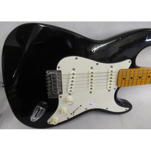 315 - 1970's / 80's Stratocaster type six string electric guitar with black body (bearing decals)