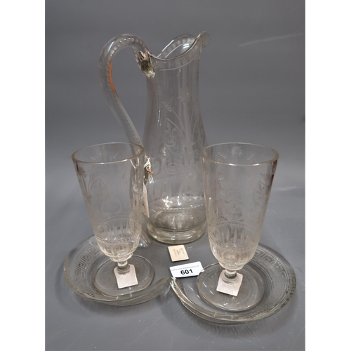 601 - Victorian etched glass lemonade set comprising:  a baluster form jug with scroll handle, two pedesta... 