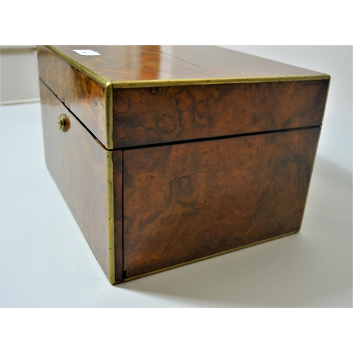 694 - Victorian burr walnut brass mounted dressing case having hinged cover and fall front enclosing a fit... 