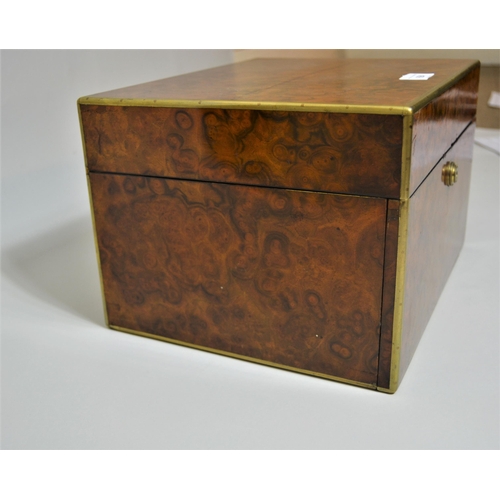 694 - Victorian burr walnut brass mounted dressing case having hinged cover and fall front enclosing a fit... 