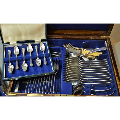 710 - Goldsmiths & Silversmiths Company, oak cased canteen of silver plated Old English pattern cutlery (i... 