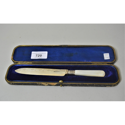 720 - Sheffield silver and mother of pearl bread knife in a fitted case